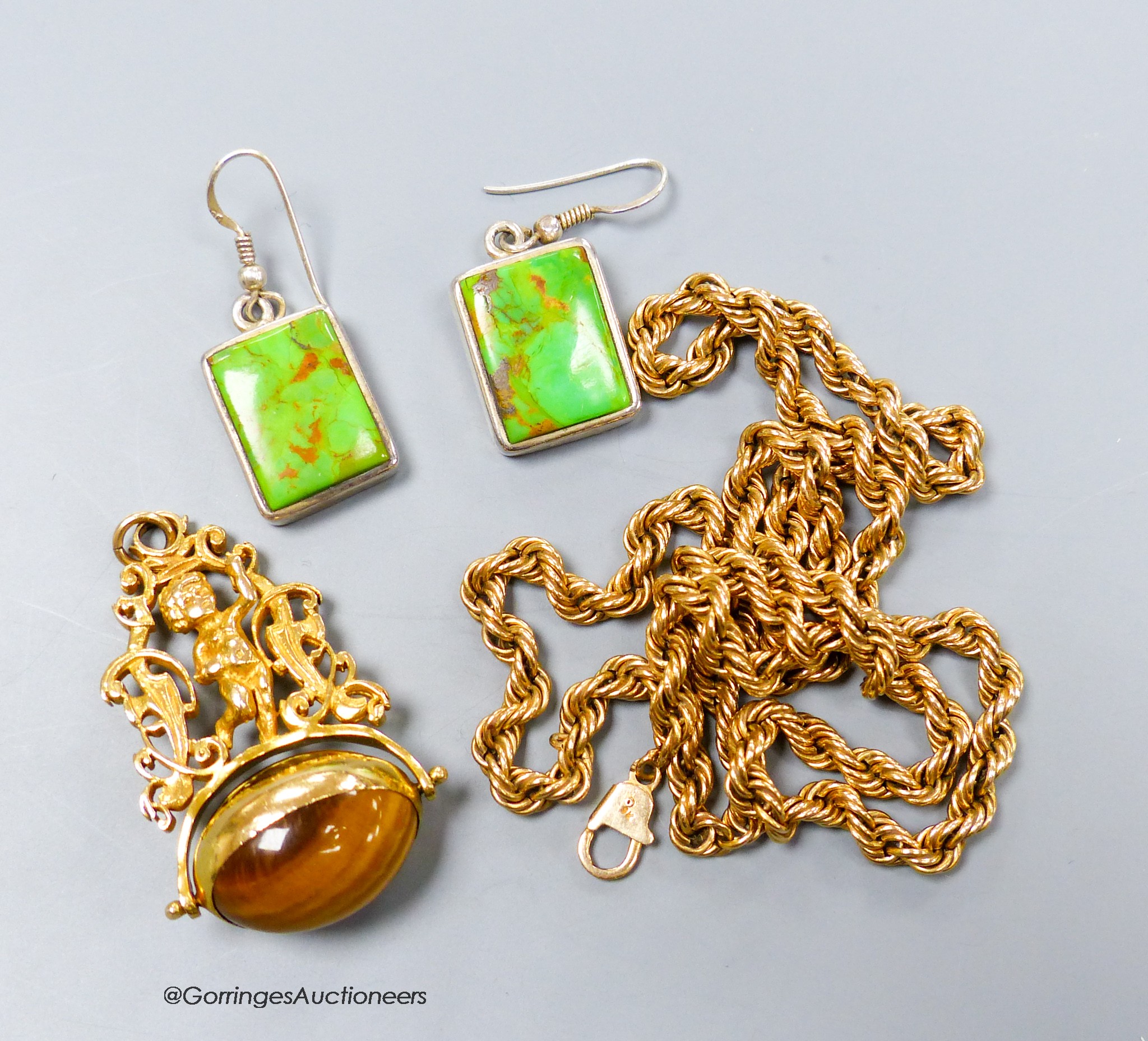 A 9ct. gold chain, 11.3 grams, a yellow metal and tiger's eye pendant, gross 15 grams and a pair of 925 mounted earrings.